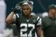 New York Jets cornerback Dee Milliner (27) adjusts his helmet during pregame practice of a NFL football game against the Miami Dolphins in Miami Gardens, Fla., Sunday, Dec. 29, 2013. (AP Photo/Alan Diaz)