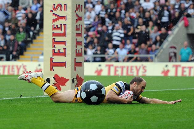 LEIGH, ENGLAND - AUGUST 10: Liam Finn of Castleford Tigers goes over for a try during the Tetley's Challenge Cup Semi Final match between Widnes Vikings and Castleford Tigers at Leigh Sports Village on August 10, 2014 in Leigh, England. (Photo by Chris Brunskill/Getty Images)