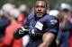 Seattle Seahawks' Percy Harvin stands on the sidelines at an NFL football camp practice Sunday, July 27, 2014, in Renton, Wash. (AP Photo/Elaine Thompson)