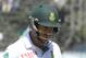 South African batsman Faf du Plessis walks off the pitch after been caught for 98 runs during the Test match against Zimbabwe at Harare Sports club, Monday, Aug. 11, 2014. (AP Photo/Tsvangirayi Mukwazhi)