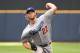 Aug 10, 2014; Milwaukee, WI, USA; Los Angeles Dodgers pitcher Clayton Kershaw (22) pitches in the first inning against the Milwaukee Brewers at Miller Park. Mandatory Credit: Benny Sieu-USA TODAY Sports