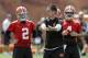 Cleveland Browns offensive coordinator Kyle Shanahan talks to quarterback Johnny Manziel (2) during organized team activities at the NFL football team's facility in Berea, Ohio Tuesday, June 3, 2014. (AP Photo/Mark Duncan)