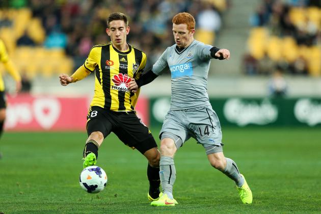 WELLINGTON, NEW ZEALAND - JULY 26:  Alejandro Gorrin of the Phoenix holds off Jack Colback of Newcastle United during the Football United New Zealand Tour 2014 match between the Wellington Phoenix and Newcastle United at Westpac Stadium on July 26, 2014 in Wellington, New Zealand.  (Photo by Hagen Hopkins/Getty Images)
