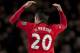 Manchester United's Robin van Persie celebrates after scoring against Fulham during their English Premier League soccer match at Old Trafford Stadium, Manchester, England, Sunday Feb. 9, 2014. (AP Photo/Jon Super)