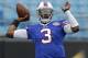 Buffalo Bills' EJ Manuel (3) warms up before a preseason NFL football game in Charlotte, N.C., Friday, Aug. 8, 2014. (AP Photo/Bob Leverone)
