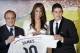 Real Madrid president Florentino Perez, left, and new Real Madrid player James Rodriguez, from Colombia, right, accompanied by his wife Daniela Ospina, pose for photographers holding his new shirt during his official presentation at the Santiago Bernabeu stadium in Madrid, Spain, Tuesday, July 22, 2014, after signing for Real Madrid. Real Madrid have signed Rodriguez from Monaco on a six-year contract, (AP Photo/Daniel Ochoa de Olza)