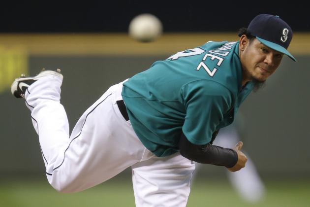 Seattle Mariners starting pitcher Felix Hernandez watches a pitch against theToronto Blue Jays in the fourth inning of a baseball game, Monday, Aug. 11, 2014, in Seattle. (AP Photo/Ted S. Warren)