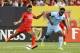 IMAGE DISTRIBUTED FOR GUINNESS INTERNATIONAL CHAMPIONS CUP - Forward Raheem Sterling (31) of Liverpool FC shoots and scores a second half goal while being defended by midfielder Emyr Huws (52) of Manchester City during the Guinness International Champions Cup on Wednesday, July 30, 2014 at the Yankee Stadium in Bronx, New York. (Adam Hunger/AP Images for Guinness International Champions Cup)