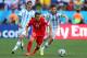 SAO PAULO, BRAZIL - JULY 01: Xherdan Shaqiri of Switzerland is challenged by Angel di Maria (L) and Jose Maria Basanta of Argentina during the 2014 FIFA World Cup Brazil Round of 16 match between Argentina and Switzerland at Arena de Sao Paulo on July 1, 2014 in Sao Paulo, Brazil. (Photo by Jamie Squire/Getty Images)