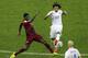 Portugal's William Carvalho, left, and United States' Jermaine Jones challenge for the ball during the group G World Cup soccer match between the USA and Portugal at the Arena da Amazonia in Manaus, Brazil, Sunday, June 22, 2014. (AP Photo/Themba Hadebe)