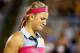MONTREAL, QC - AUGUST 08: Victoria Azarenka of Belarus reacts after a shot to Agnieszka Radwanska of Poland in their quarterfinal match during the Rogers Cup at Uniprix Stadium on August 8, 2014 in Montreal, Canada. (Photo by Streeter Lecka/Getty Images)