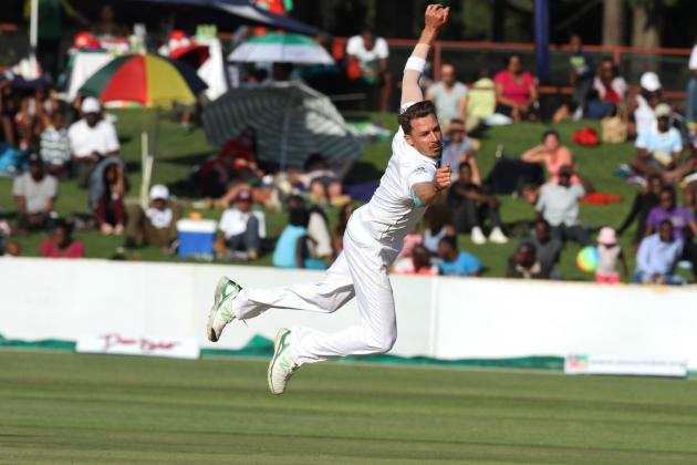 South African bowler Dale Steyn dives for the ball during the  Test match against Zimbabwe at Harare Sports club, Saturday, Aug. 9, 2014. Zimbabwe won the toss and elected to bat on the first day of the one off test against South Africa in Harare. (AP Photo/Tsvangirayi Mukwazhi)