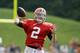 Cleveland Browns quarterback Johnny Manziel passes during practice at NFL football training camp in Berea, Ohio Tuesday, Aug. 12, 2014. (AP Photo/Mark Duncan)
