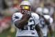 New England Patriots running back Stevan Ridley runs with the ball during an NFL football training camp practice at Gillette Stadium, Sunday, July 27, 2014, in Foxborough, Mass. (AP Photo/Steven Senne)