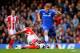 LONDON, ENGLAND - APRIL 05: Wilson Palacios of Stoke City tackles Andre Schurrle of Chelsea during the Barclays Premier League match between Chelsea and Stoke City at Stamford Bridge on April 5, 2014 in London, England. (Photo by Mike Hewitt/Getty Images)