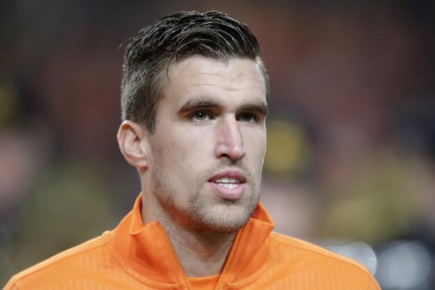 In this Nov. 19, 2013 image Netherlands' Kevin Strootman lines up prior to the international friendly soccer match between Netherlands and Colombia at ArenA stadium in Amsterdam, Netherlands. In a severe blow to Dutch World Cup hopes, Netherlands coach Louis van Gaal said Monday March 10, 2014, that midfielder Kevin Strootman will miss the tournament after suffering a serious knee injury over the weekend playing for his club AS Roma. (AP Photo/Peter Dejong)