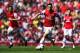 LONDON, ENGLAND - MAY 04: Mesut Ozil of Arsenal runs with the ball during the Barclays Premier League match between Arsenal and West Bromwich Albion at the Emirates Stadium on May 4, 2014 in London, England. (Photo by Shaun Botterill/Getty Images)