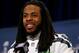 JERSEY CITY, NJ - JANUARY 30: Richard Sherman #25 of the Seattle Seahawks addresses the media during Super Bowl XLVIII media availability at the Westin Hotel January 30, 2014 in Jersey City, New Jersey. The Denver Broncos and Seattle Seahawks will meet in Super Bowl XLVIII at Metlife Stadium on February 2, 2014. (Photo by Elsa/Getty Images)
