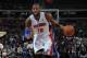 AUBURN HILLS, MI - FEBRUARY 18: Greg Monroe #10 of the Detroit Pistons dribbles the ball against the Charlotte Bobcats during the game on February 18, 2014 at The Palace of Auburn Hills in Auburn Hills, Michigan. NOTE TO USER: User expressly acknowledges and agrees that, by downloading and/or using this photograph, User is consenting to the terms and conditions of the Getty Images License Agreement. Mandatory Copyright Notice: Copyright 2014 NBAE (Photo by Allen Einstein/NBAE via Getty Images)