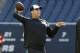 Jacksonville Jaguars quarterback Chad Henne (7) passes the ball during warmups before an NFL preseason football game against the Chicago Bears in Chicago, Thursday, Aug. 14, 2014. (AP Photo/Stacy Thacker)