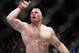 Brock Lesnar celebrates his UFC heavyweight mixed martial arts title match win against Shane Carwin Saturday, July 3, 2010, at The MGM Grand Garden Arena in Las Vegas. (AP Photo/Eric Jamison)