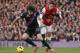 Arsenal's Mesut Ozil, right, competes with Crystal Palace's Mile Jedinak during their English Premier League soccer match at Emirates Stadium in London, Sunday, Feb. 2, 2014. (AP Photo/Sang Tan)