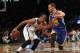 Jan 8, 2014; Brooklyn, NY, USA; Brooklyn Nets point guard Shaun Livingston (14) controls the ball in front of Golden State Warriors point guard Stephen Curry (30) during the fourth quarter of a game at Barclays Center. The Nets defeated the Warriors 102-98. Mandatory Credit: Brad Penner-USA TODAY Sports