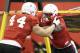 Nebraska defensive end Randy Gregory (4) and Nebraska defensive lineman Mick Stoltenberg (44) participate in a drill during team practice in Lincoln, Neb., Wednesday, Aug. 13, 2014. (AP Photo/Nati Harnik)