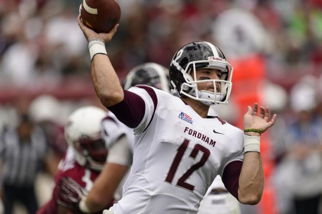 Sep 14, 2013; Philadelphia, PA, USA; Fordham Rams quarterback Michael Nebrich (12) passes the ball during the second quarter against the Temple Owls at Lincoln Financial Field. Fordham defeated Temple 30-29. Mandatory Credit: Howard Smith-USA TODAY Sports