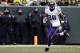 Minnesota Vikings' Adrian Peterson runs during the first half of an NFL football game against the Green Bay Packers Sunday, Nov. 24, 2013, in Green Bay, Wis. (AP Photo/Mike Roemer)