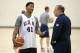 Derrick Rose, left, talks with assistant coach Tom Thibodeau during a practice of the men's U.S. National basketball team Thursday, Aug. 14, 2014, in Chicago. The U.S. team will face the Brazilian team in an exhibition game at the United Center in Chicago Saturday. (AP Photo/Charles Rex Arbogast)