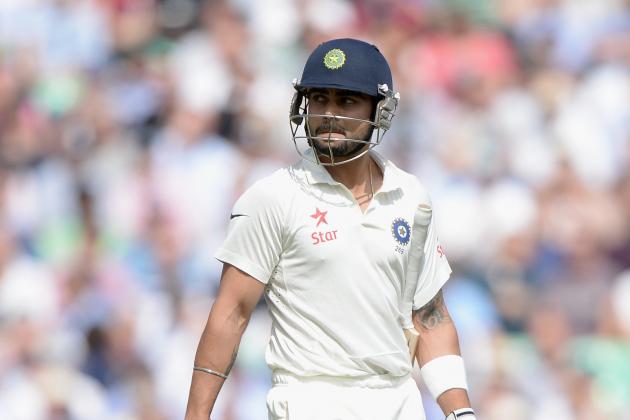 LONDON, ENGLAND - AUGUST 15: Virat Kohli of India leaves the field after being dismissed by Chris Jordan of England during day one of 5th Investec Test match between England and India at The Kia Oval on August 15, 2014 in London, England. (Photo by Gareth Copley/Getty Images)