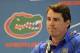 Florida NCAA college head football coach Will Muschamp fields questions from reporters during Media Day at the University of Florida in Gainesville, Fla., Sunday, Aug, 3, 2014. (AP Photo/Phil Sandlin)
