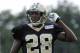 Jul 28, 2014; White Sulpher Springs, WV, USA; New Orleans Saints cornerback Keenan Lewis (28) walks off the field during training camp at The Greenbrier. Mandatory Credit: Michael Shroyer-USA TODAY Sports