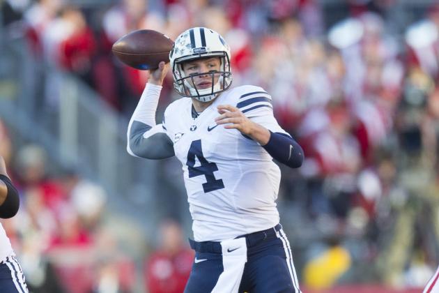 Nov 9, 2013; Madison, WI, USA; Brigham Young Cougars quarterback Taysom Hill (4) throws a pass during the first quarter against the Wisconsin Badgers at Camp Randall Stadium. Mandatory Credit: Jeff Hanisch-USA TODAY Sports
