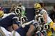 Green Bay Packers linebacker Clay Matthews waits for the snap on the line of scrimmage during the second quarter of an NFL preseason football game against the St. Louis Rams Saturday, Aug. 16, 2014, in St. Louis. (AP Photo/Tom Gannam)