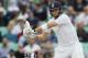 England's Joe Root goes to hit four runs off a ball bowled by India's Ishant Sharma during the third day of the fifth test cricket match at Oval cricket ground in London, Sunday, Aug. 17, 2014. (AP Photo/Alastair Grant)