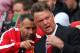 MANCHESTER, ENGLAND - AUGUST 16: Manchester United Manager Louis van Gaal speaks with Assistant Ryan Giggs (L) prior to the Barclays Premier League match between Manchester United and Swansea City at Old Trafford on August 16, 2014 in Manchester, England. (Photo by Alex Livesey/Getty Images)