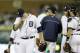 Detroit Tigers relief pitcher Joe Nathan is pulled by manager Brad Ausmus, center, during the ninth inning of a baseball game against the Toronto Blue Jays in Detroit, Tuesday, June 3, 2014. (AP Photo/Carlos Osorio)
