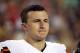 Cleveland Browns quarterback Johnny Manziel (2) stands during the National Anthem before an NFL preseason football game against the Washington Redskins Monday, Aug. 18, 2014, in Landover, Md. (AP Photo/Alex Brandon)