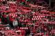Scarves are held aloft as supporters sing before Liverpool's English Premier League soccer match against Stoke at Anfield Stadium, Liverpool, England, Sunday, Oct. 7, 2012. (AP Photo/Jon Super)