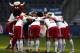 SALZBURG, AUSTRIA - MARCH 23: Players of Salzburg and their mascot stay together before the tipp3 Bundesliga match between Red Bull Salzburg and SC Wiener Neustadt at Red Bull Arena on March 23, 2014 in Salzburg, Austria. (Photo by Simon Hausberger/Getty Images)