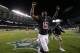 Chicago Bears wide receiver Brandon Marshall (15) runs off the field after the Bears' 20-19 win over the Jacksonville Jaguars in an NFL preseason football game in Chicago, Thursday, Aug. 14, 2014. (AP Photo/Charles Rex Arbogast)