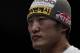 MACAU - MARCH 01: Dong Hyun Kim of South Korea looks on the octagon after defeating John Hathaway of England by knockout in their welterweight bout during the UFC Fight Night at the Cotai Arena on March 1, 2014 in Macau, China. (Photo by Victor Fraile/Getty Images)
