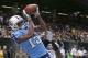 Tennessee Titans wide receiver Justin Hunter (15) pulls in a touchdown reception over New Orleans Saints cornerback Corey White (24) in the first half of a NFL preseason football game in New Orleans, Friday, Aug. 15, 2014. (AP Photo/Bill Haber)