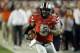 Ohio State quarterback Braxton Miller (5) runs on his way to scoring a touchdown during the first half of the Orange Bowl NCAA college football game, Friday, Jan. 3, 2014, in Miami Gardens, Fla. (AP Photo/Wilfredo Lee)