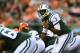 Aug 16, 2014; Cincinnati, OH, USA; New York Jets quarterback Geno Smith (7) gesture at the line of scrimmage during the second quarter against the Cincinnati Bengals at Paul Brown Stadium. Mandatory Credit: Andrew Weber-USA TODAY Sports