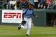 Pennsylvania pitcher Mo'ne Davis celebrates after getting the final out of a 4-0 shutout against Tennessee during a baseball game in United States pool play at the Little League World Series tournament in South Williamsport, Pa., Friday, Aug. 15, 2014. (AP Photo/Gene J. Puskar)