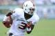 TAMPA, FL - SEPTEMBER 28: Wide receiver Stacy Coley #3 of the Miami Hurricanes runs for yardage during the first half against the South Florida Bulls on September 28, 2013 at Raymond James Stadium in Tampa, Florida. (Photo by Brian Blanco/Getty Images)