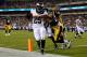 Philadelphia Eagles' LeSean McCoy (25) scores a touchdown during the first half of an NFL preseason football game against the Pittsburgh Steelers, Thursday, Aug. 21, 2014, in Philadelphia. (AP Photo/Matt Rourke)